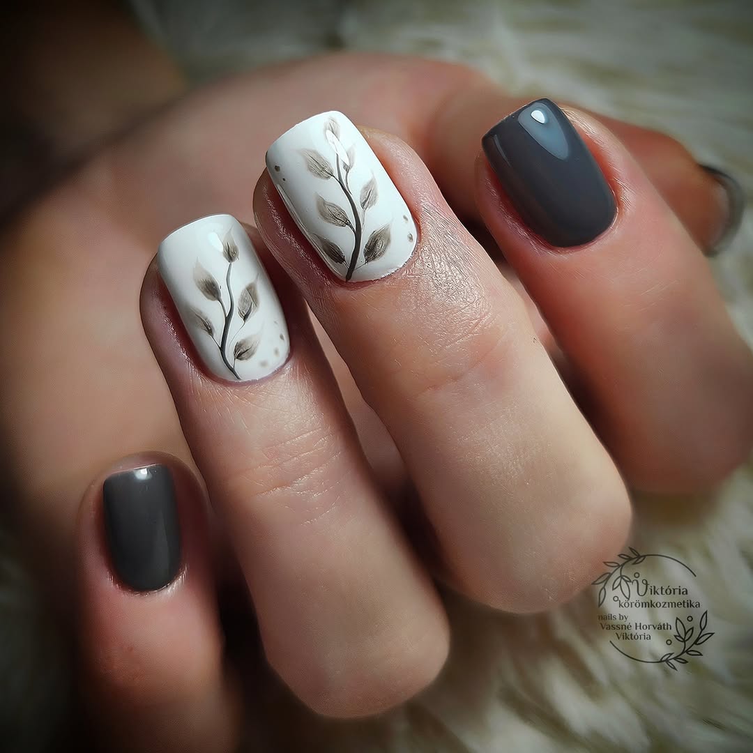Chic grey nails with delicate floral accents