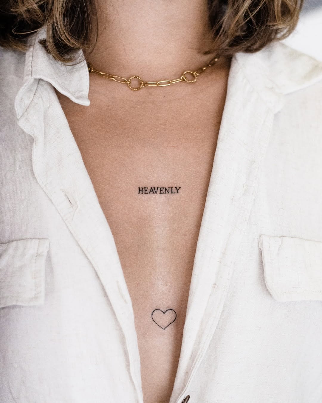 Minimalist chest tattoos with elegant vibes