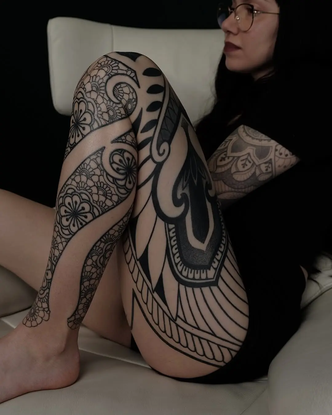 Elegant Blackwork on the Leg and Arm