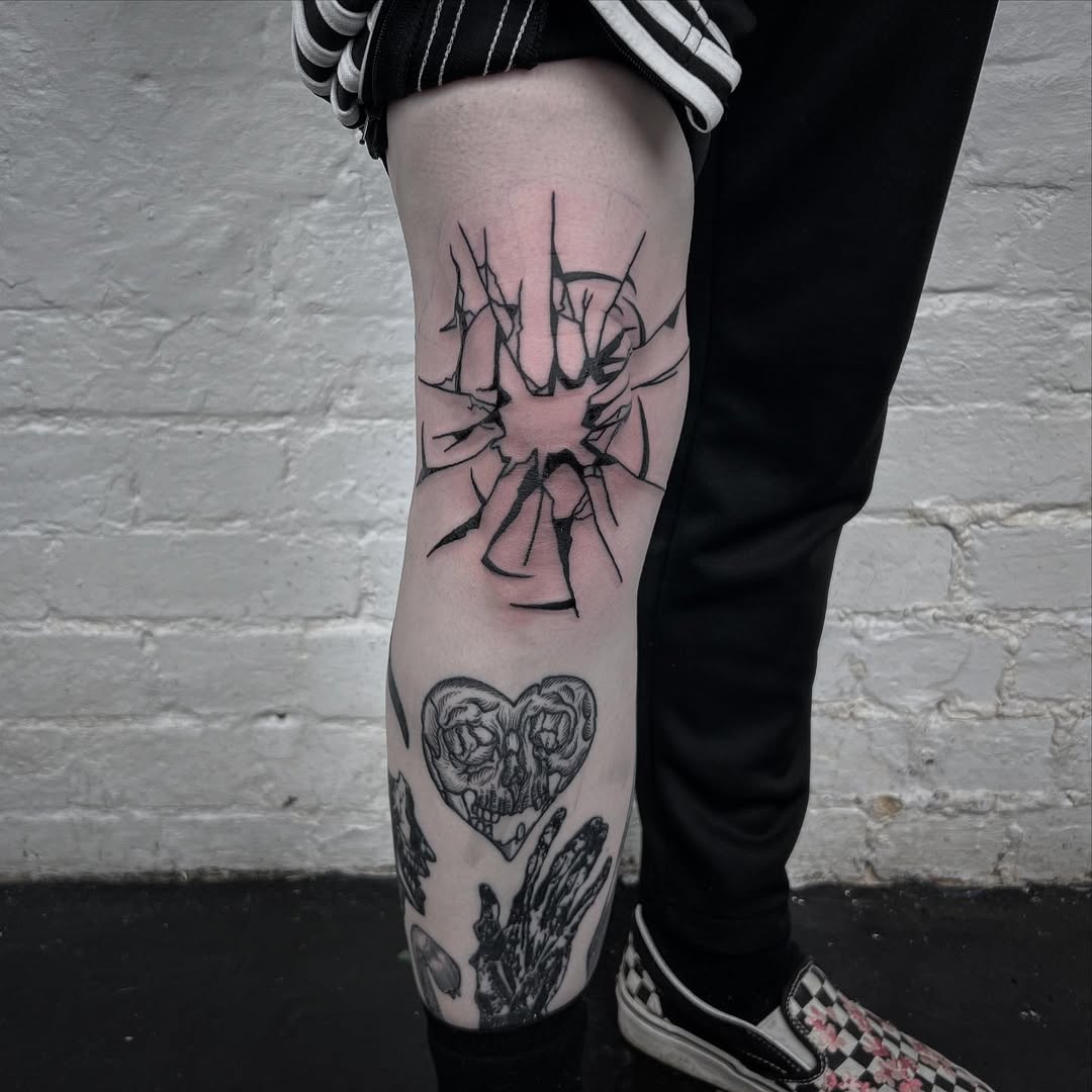 Edgy Broken Glass Knee Tattoo Design