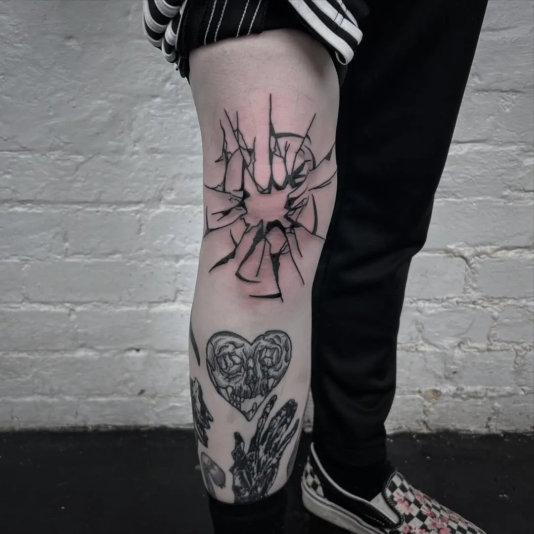 Edgy Broken Glass Knee Tattoo Design
