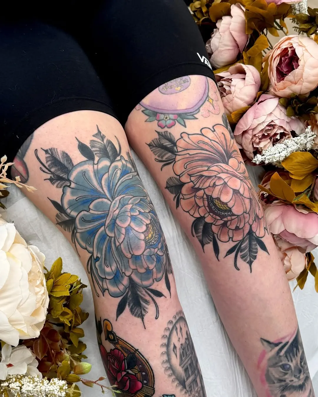 Vibrant floral knee tattoos for body art lovers
