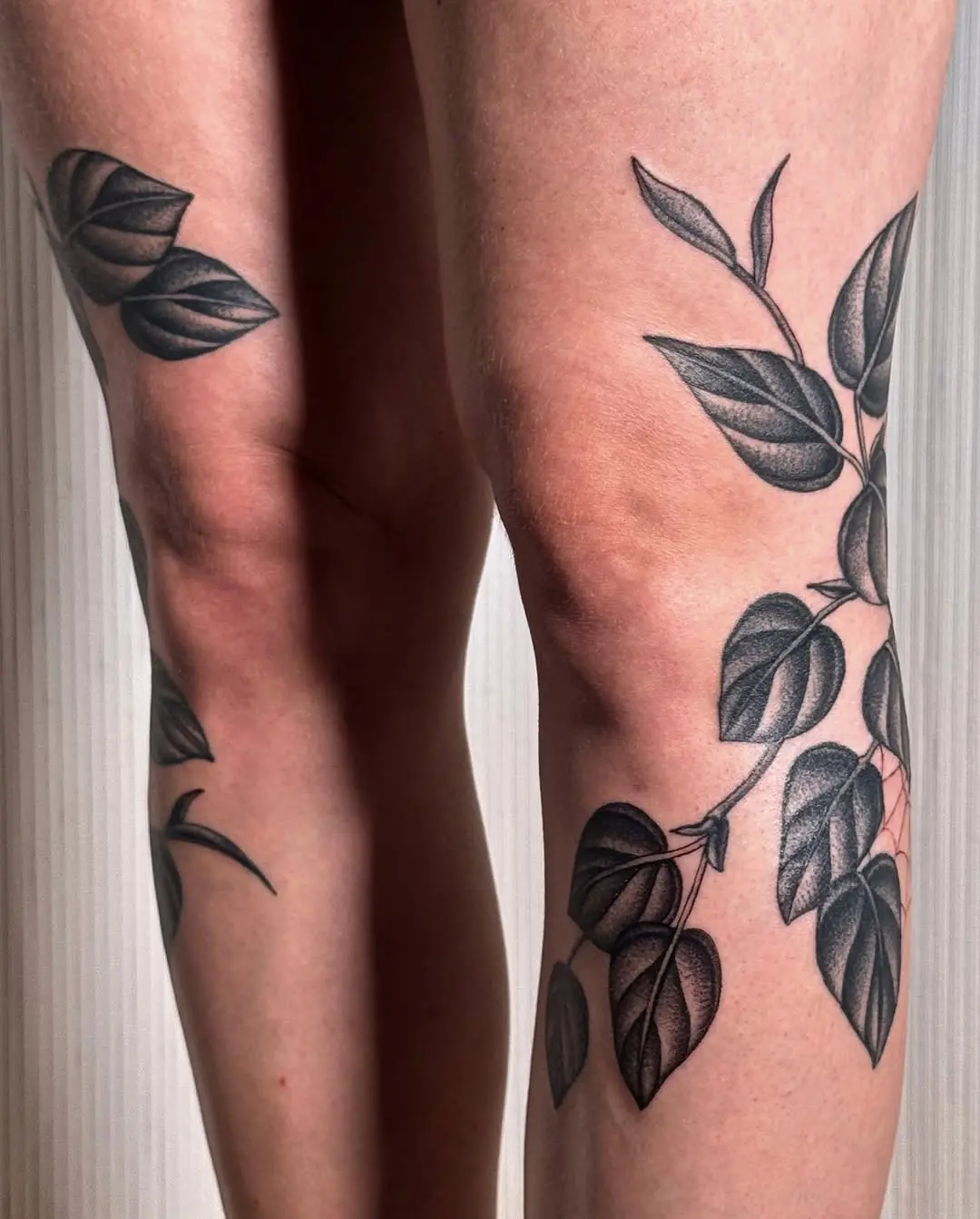 Elegant leaf designs wrap around the knees.