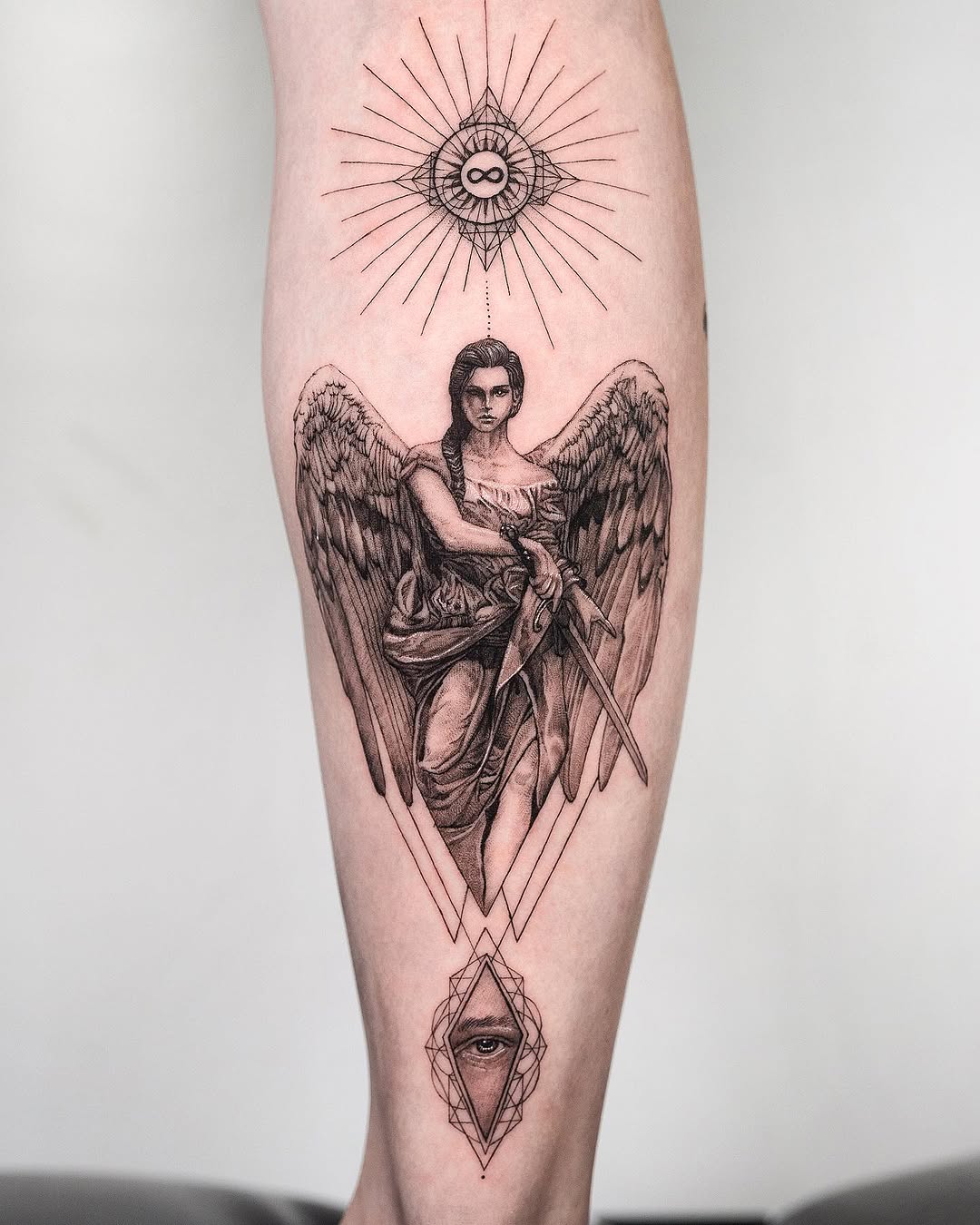 Stunning angel tattoo with powerful symbolism