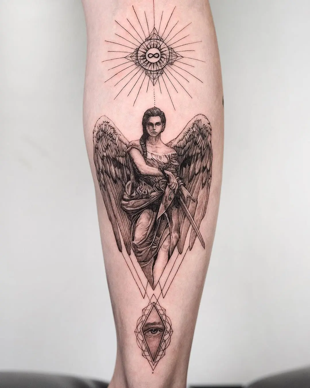 Stunning angel tattoo with powerful symbolism