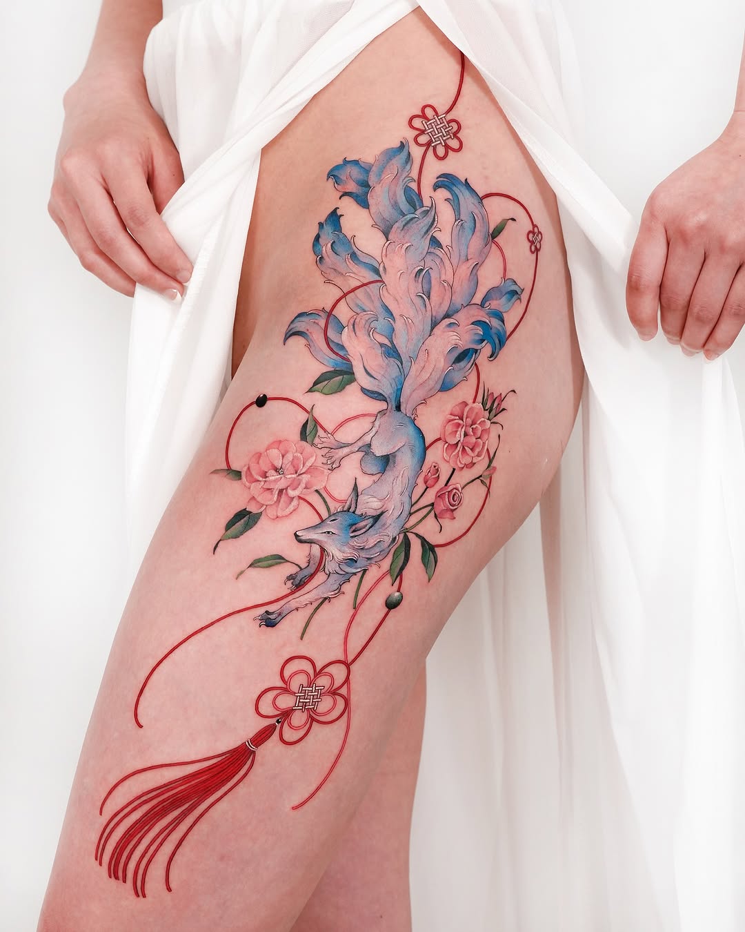 Stunning Floral Fox Tattoo on Thigh Area