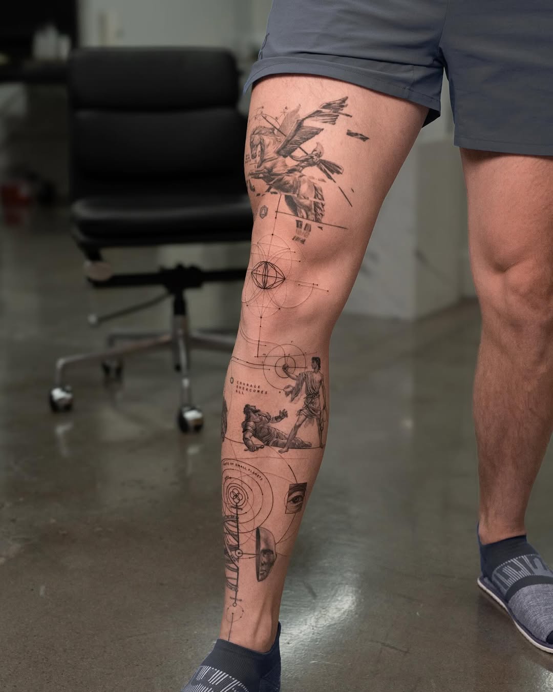 Intricate leg tattoos with artistic designs