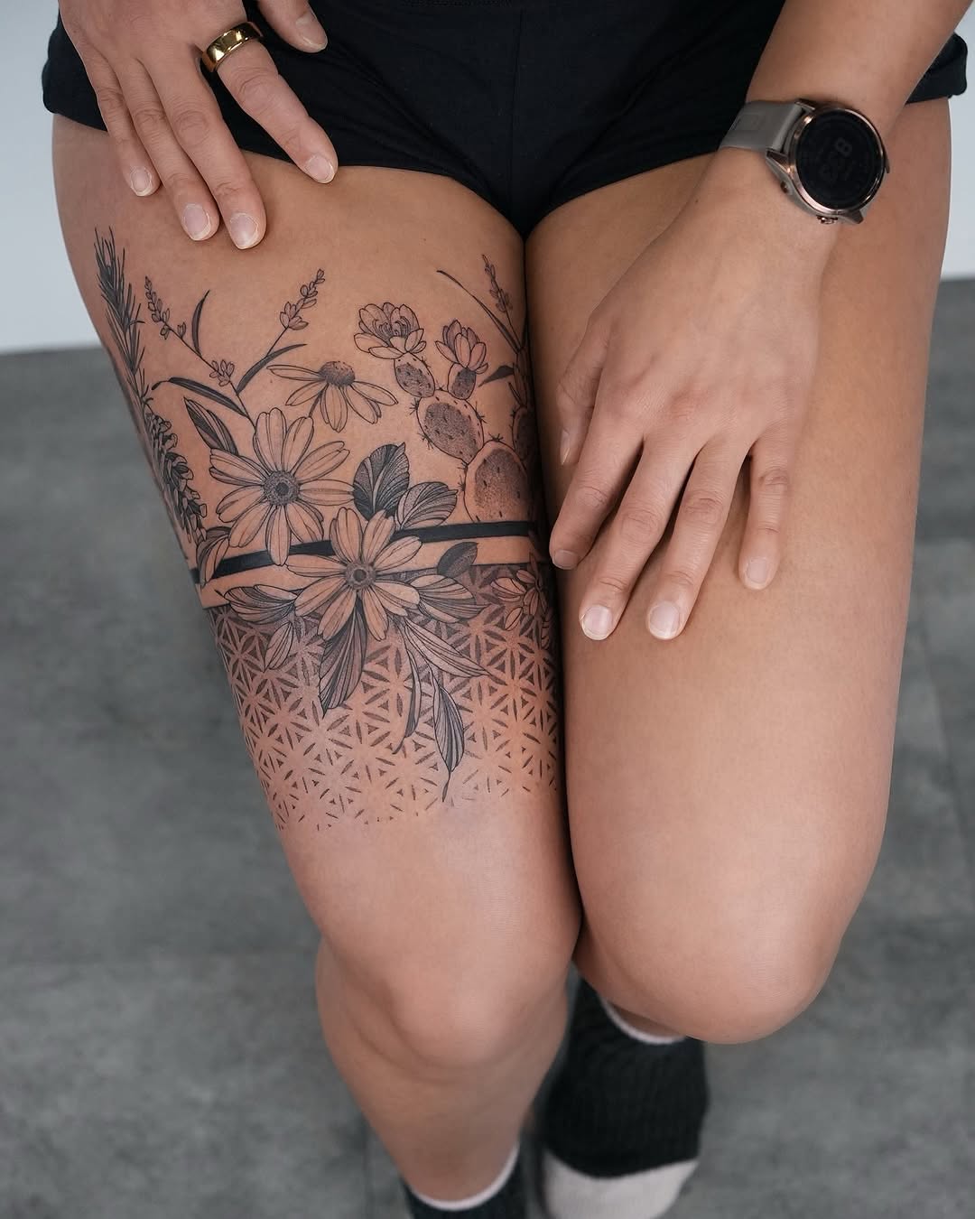 Stunning floral tattoo with geometric elements