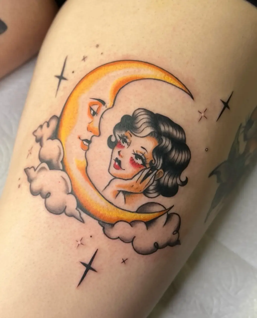 Vintage-style moon and woman tattoo design