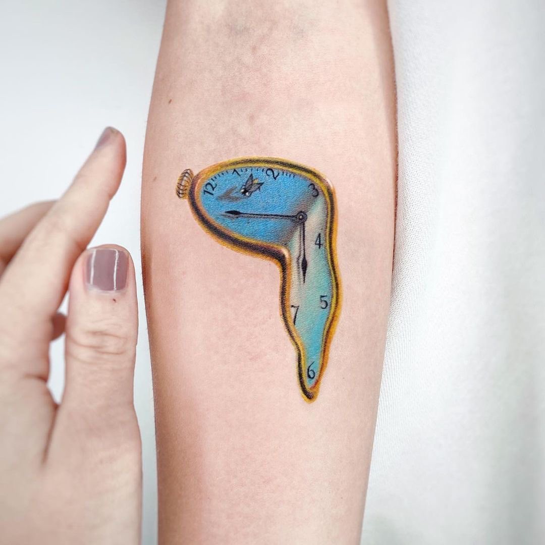 Surrealistic melting clock tattoo design