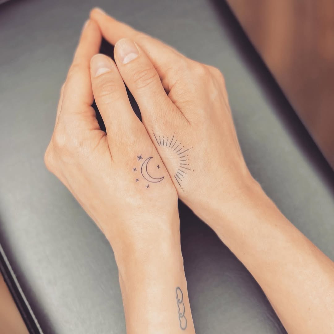 Elegant Sun and Moon Hand Tattoos