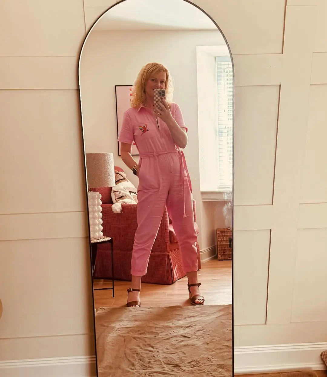 Chic and playful pink jumpsuit outfit