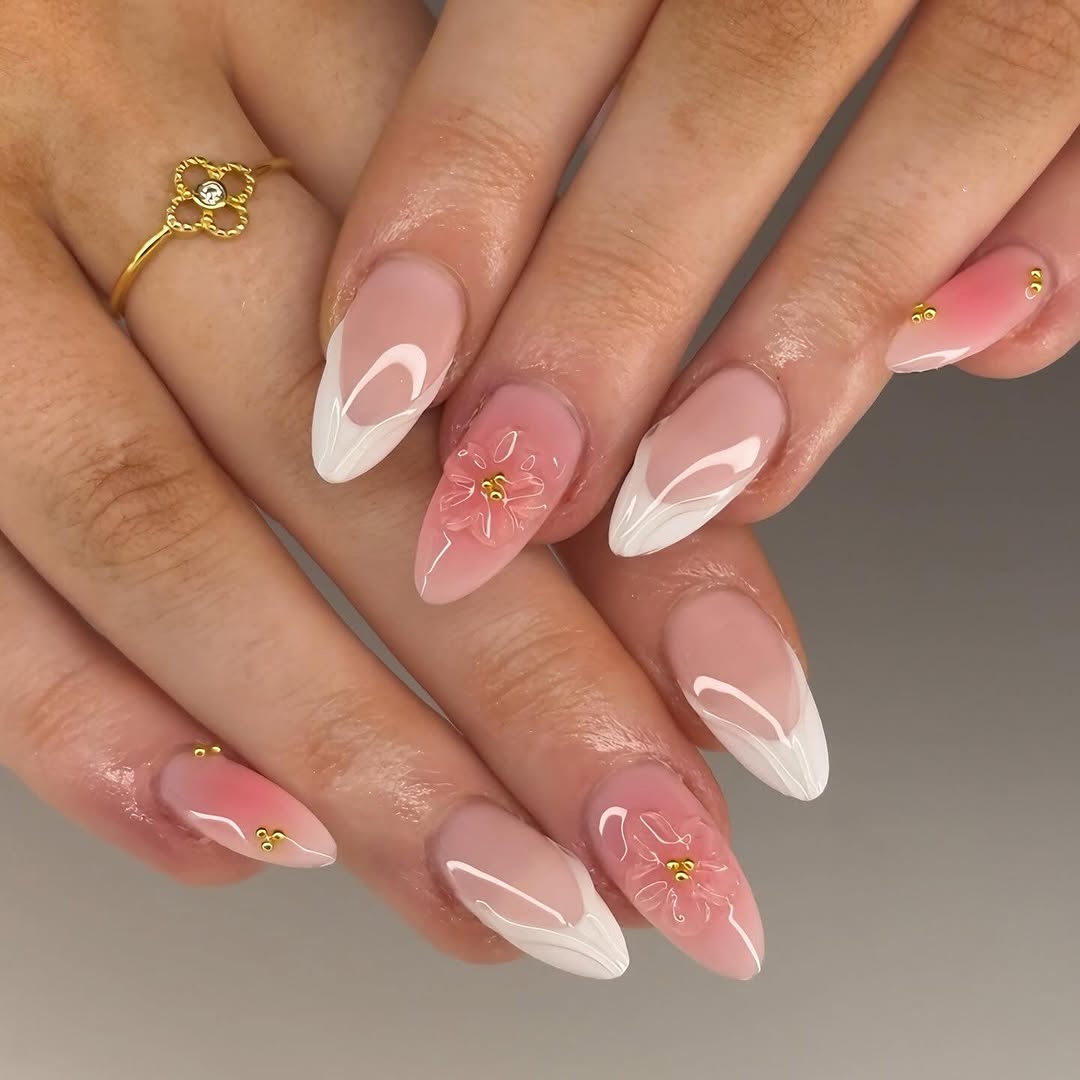 Elegant pink nails with floral accents