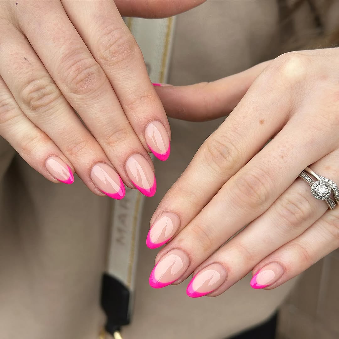 Vibrant pink french tip nail design
