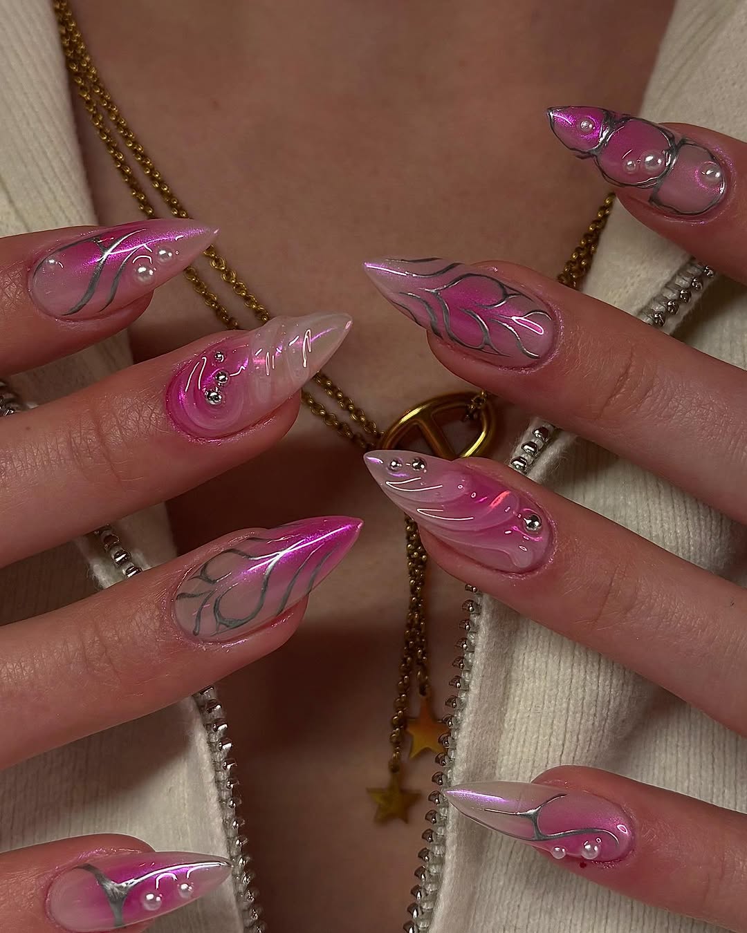 Stunning pink nails with elegant floral accents