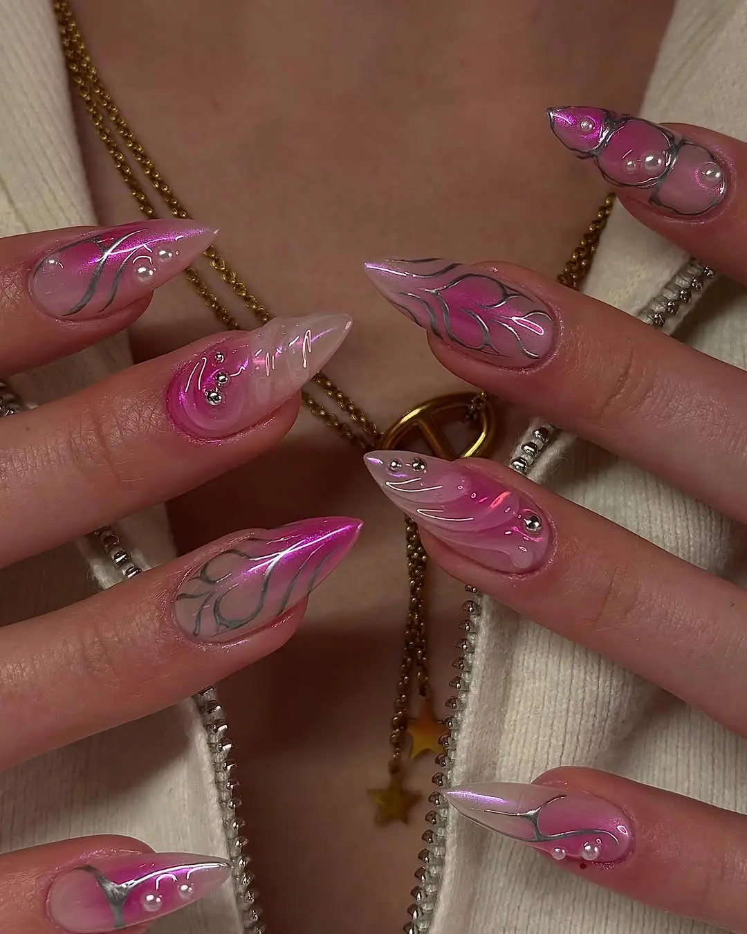 Stunning pink nails with elegant floral accents