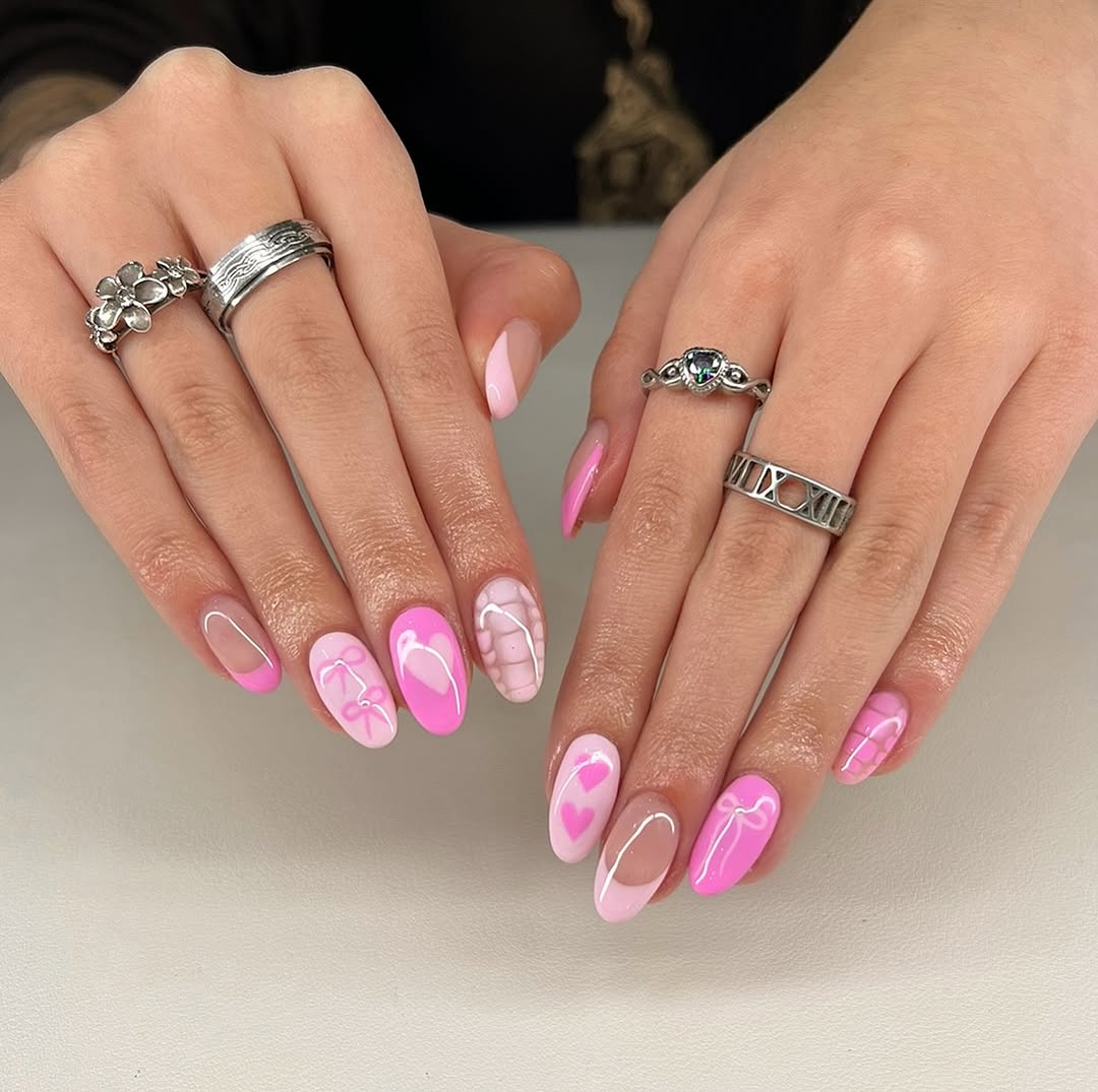 Chic Pink Nail Art with Adorable Designs
