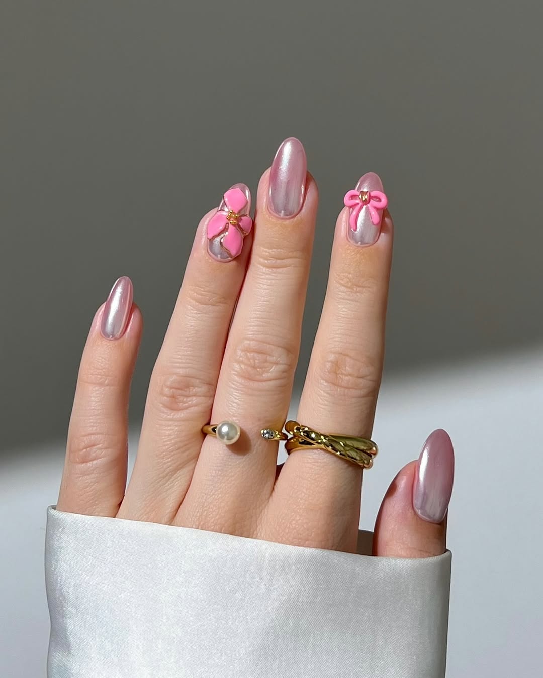 Stylish pink nails with cute accents