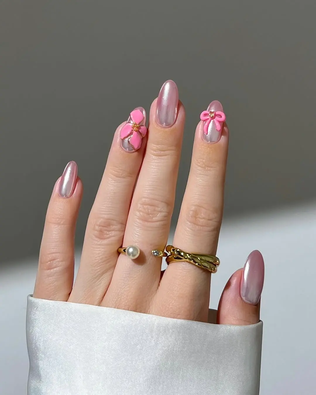Stylish pink nails with cute accents
