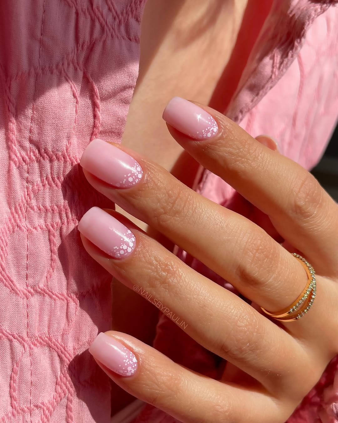 Chic pastel pink nails with sparkling tips