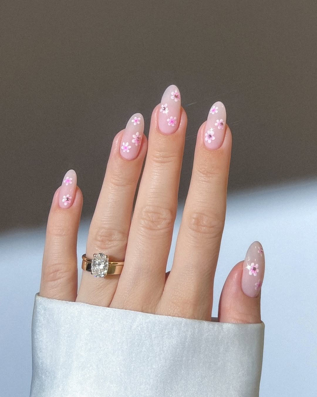 Charming pink floral design on elegant nails