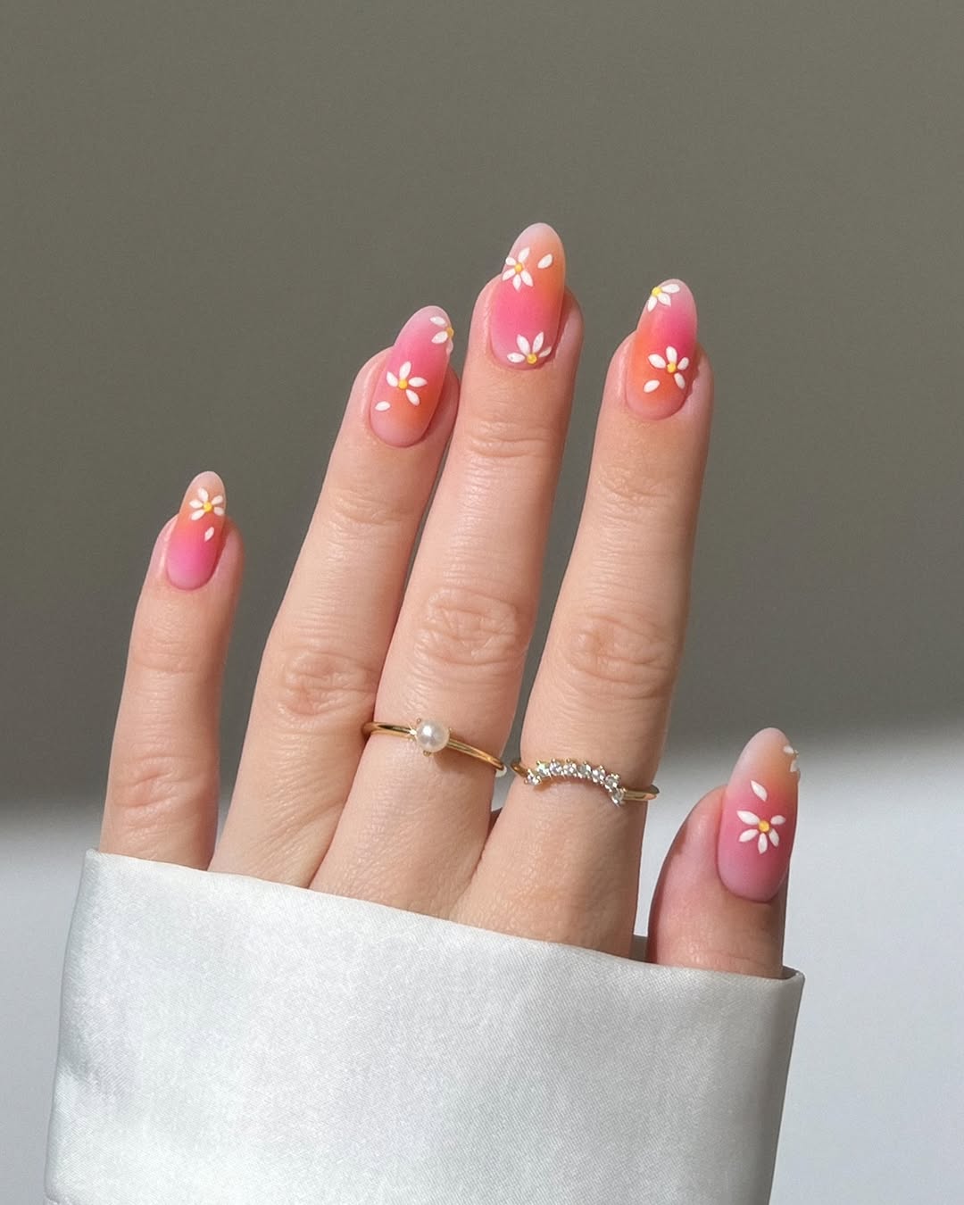 Charming Pink Nails with Floral Accents