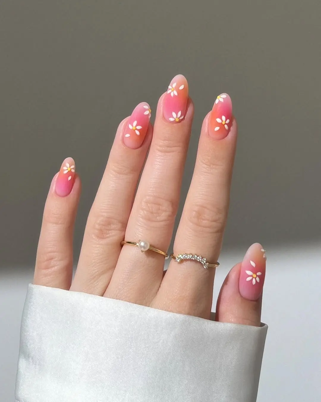 Charming Pink Nails with Floral Accents