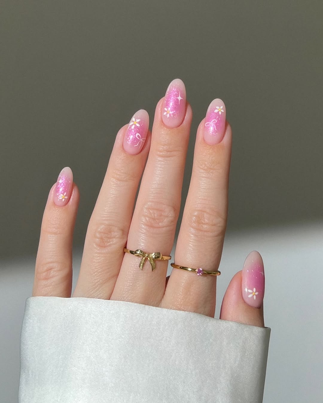 Charming Pink Nails with Floral Accents
