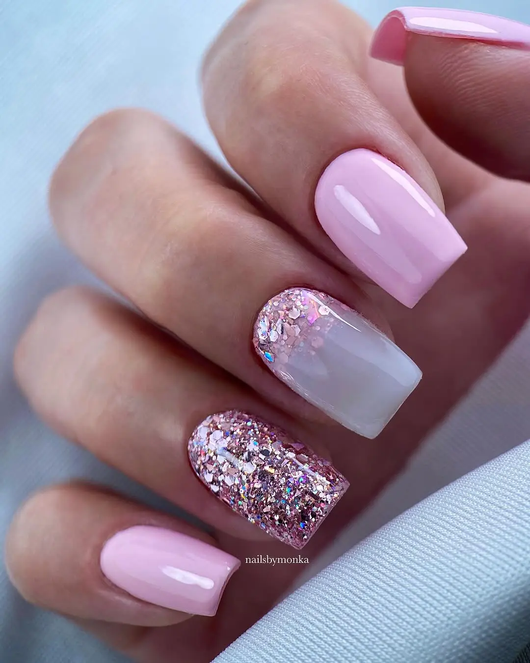Chic pink nails with sparkling flair