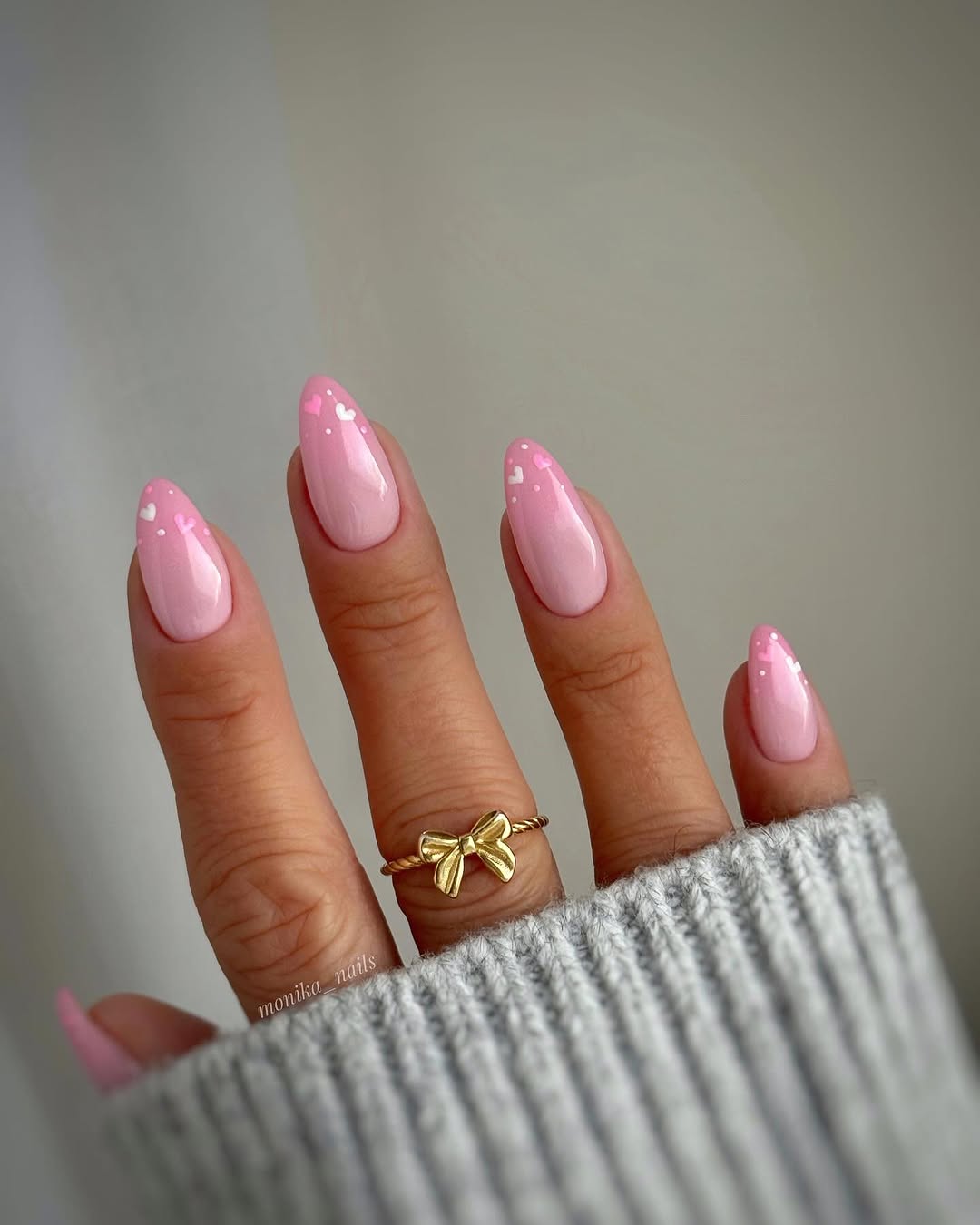 Chic pink nails with heart accents