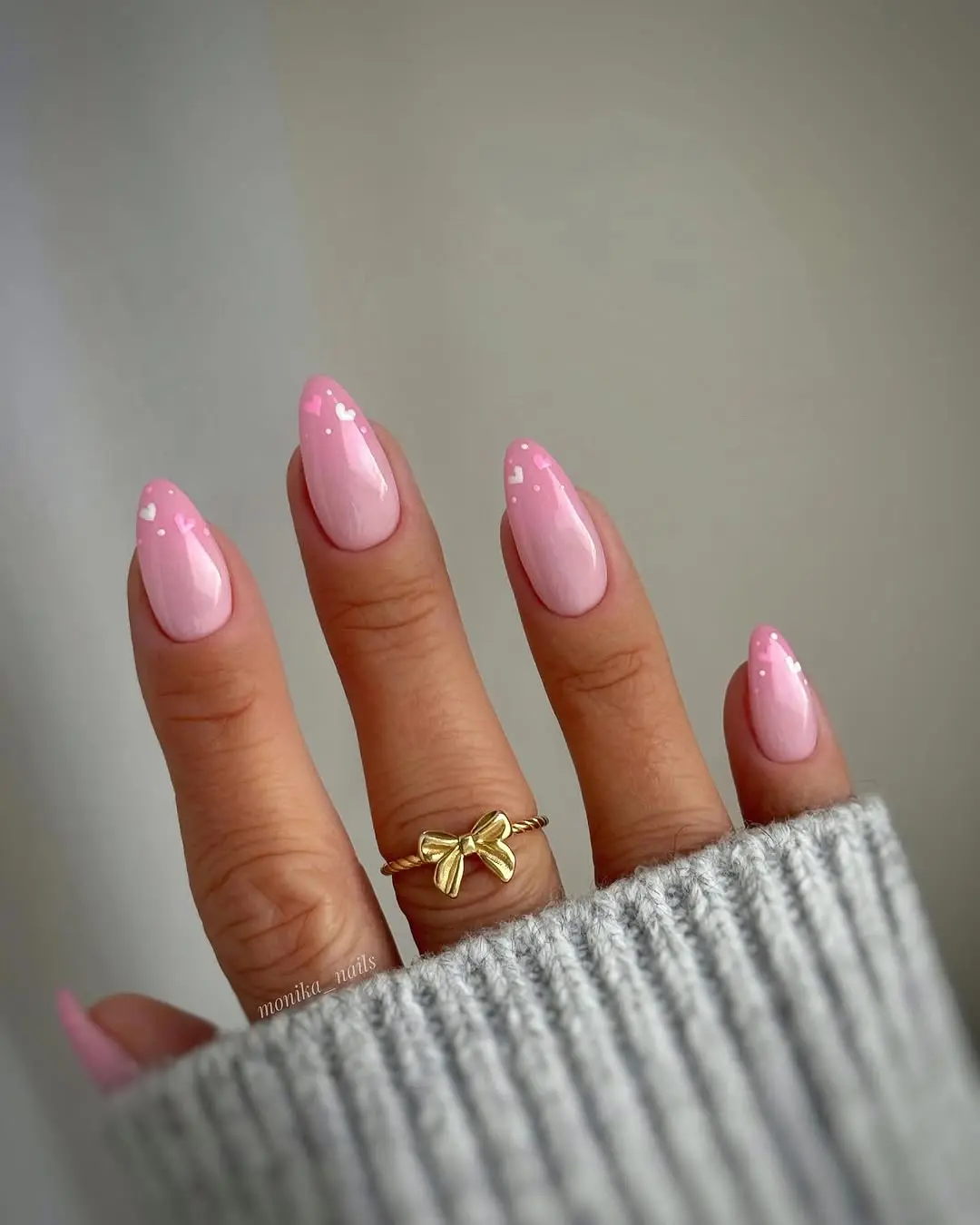 Chic pink nails with heart accents