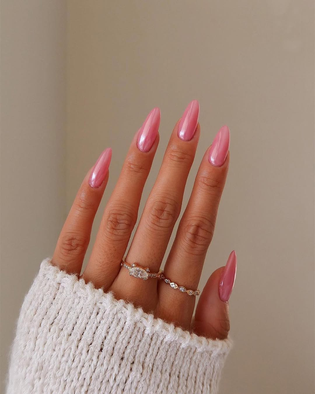 Stylish oval pink nails with a glossy finish