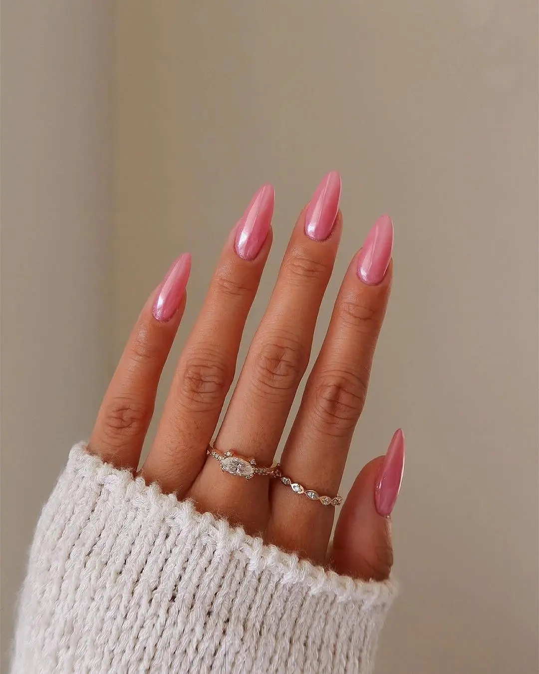 Stylish oval pink nails with a glossy finish