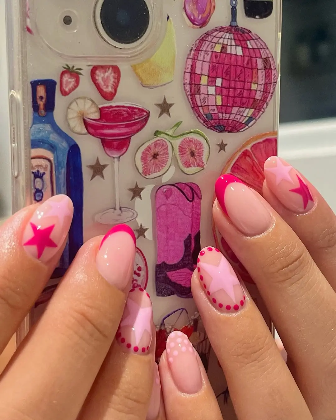 Playful pink nails with vibrant designs