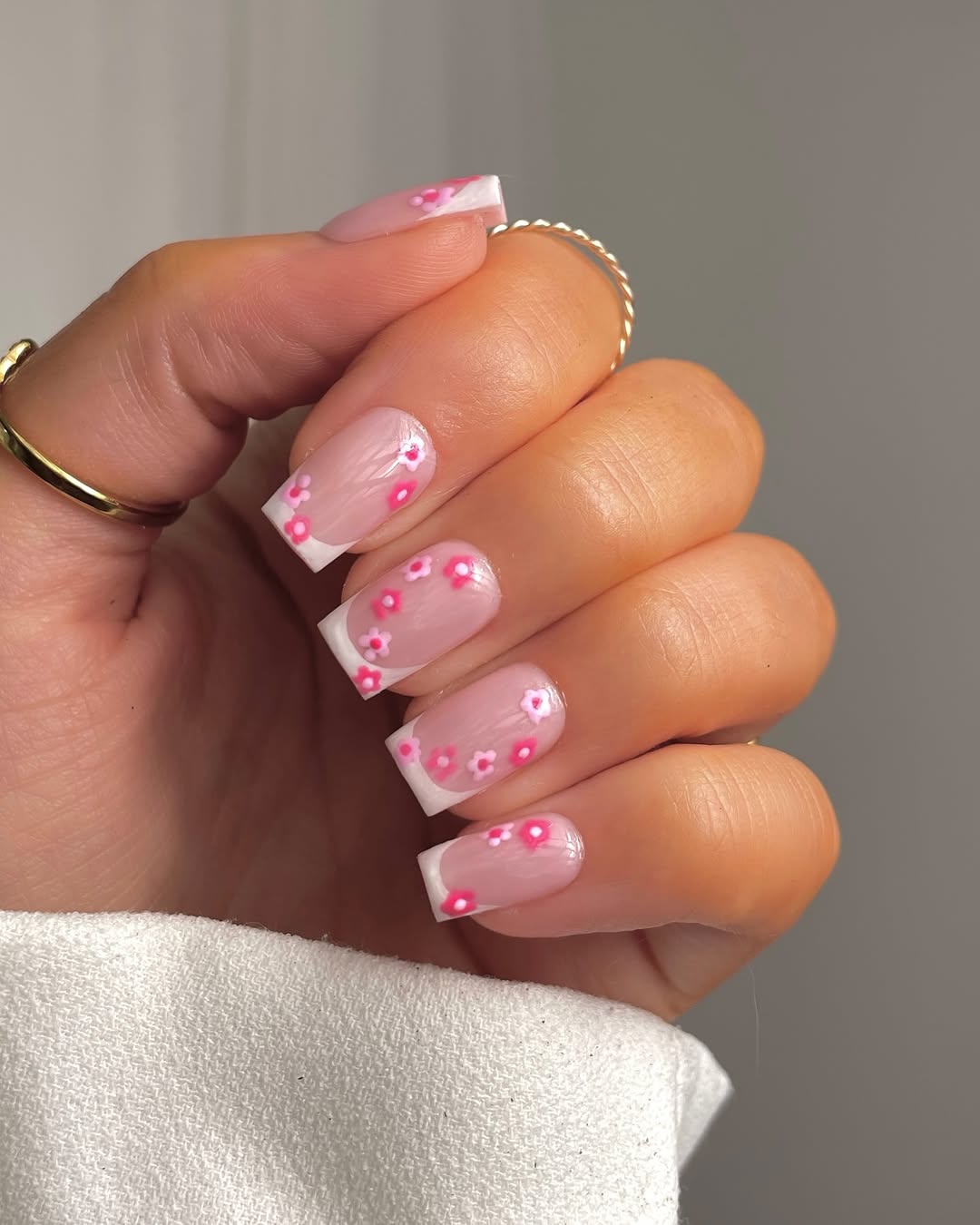 Chic pink floral nail design for spring