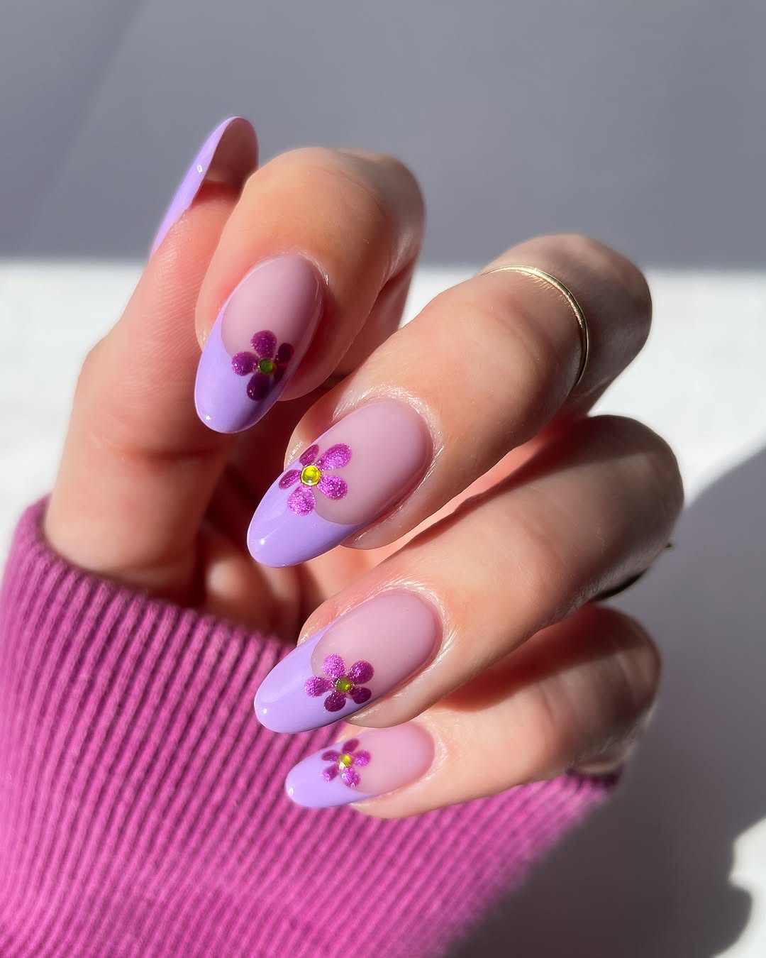 Chic purple nails with floral accents