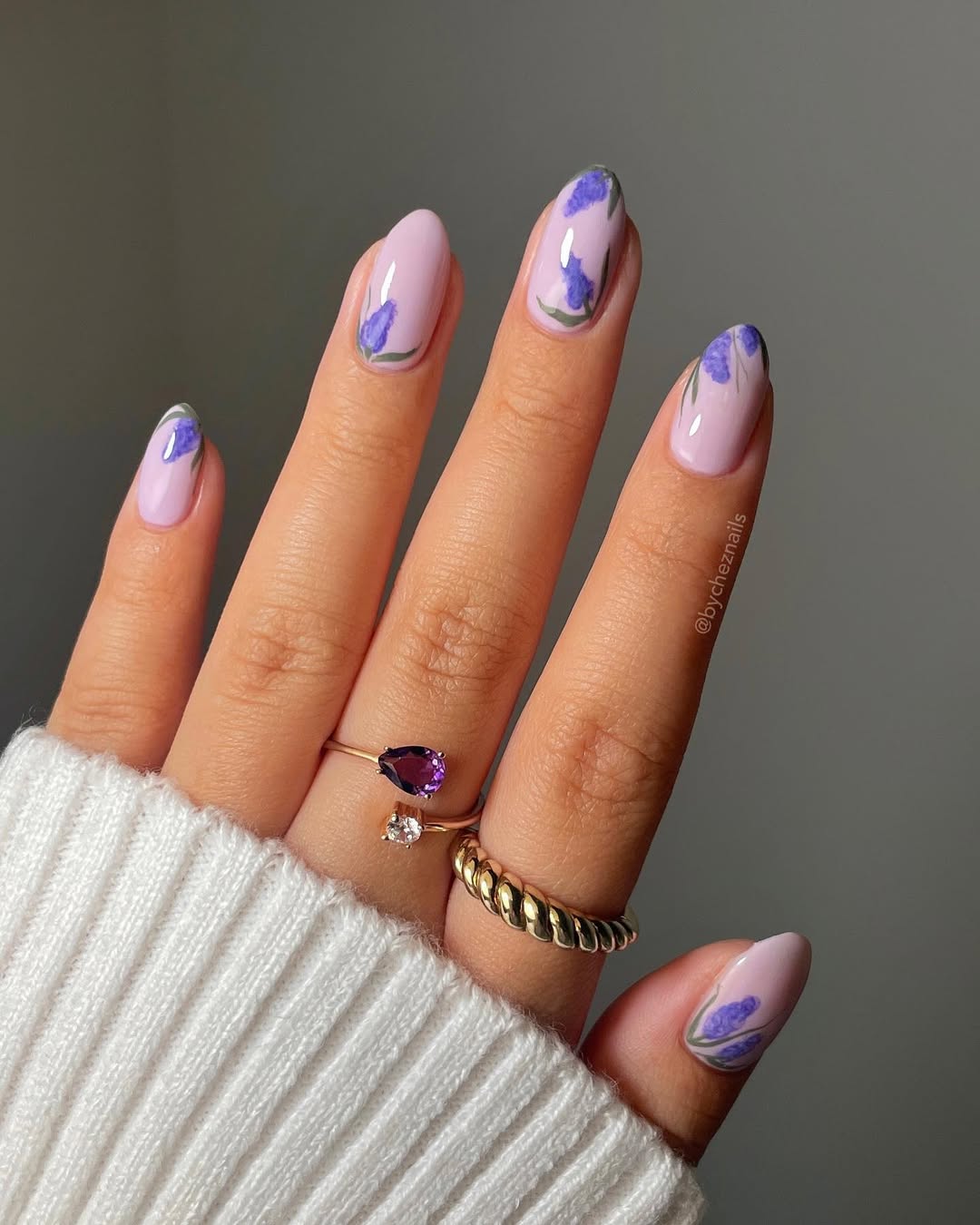 Charming lavender nails with floral accents