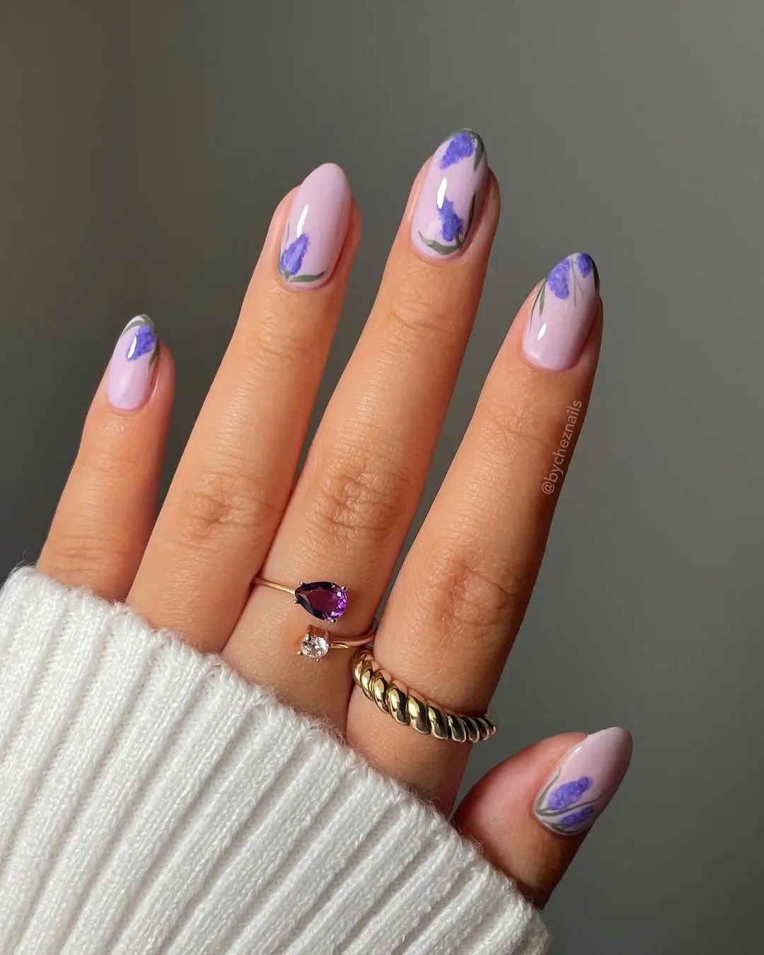 Charming lavender nails with floral accents