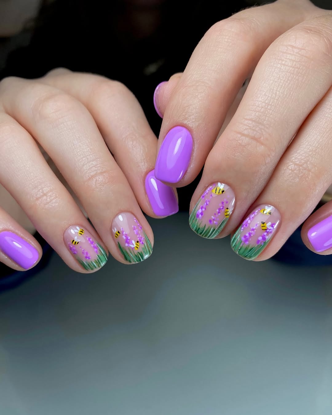 Charming purple nails with floral accents
