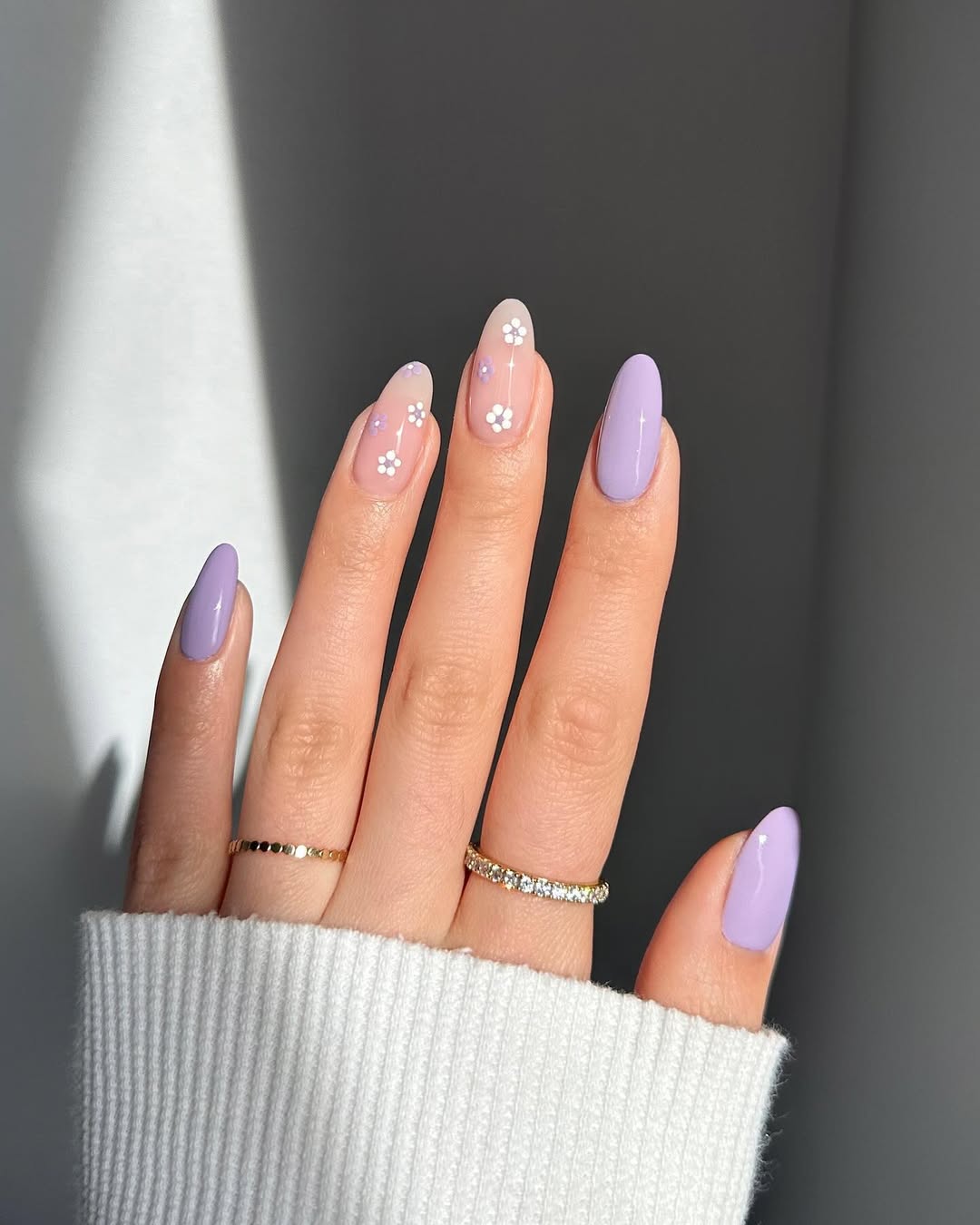 Chic Purple Nails with Floral Accents