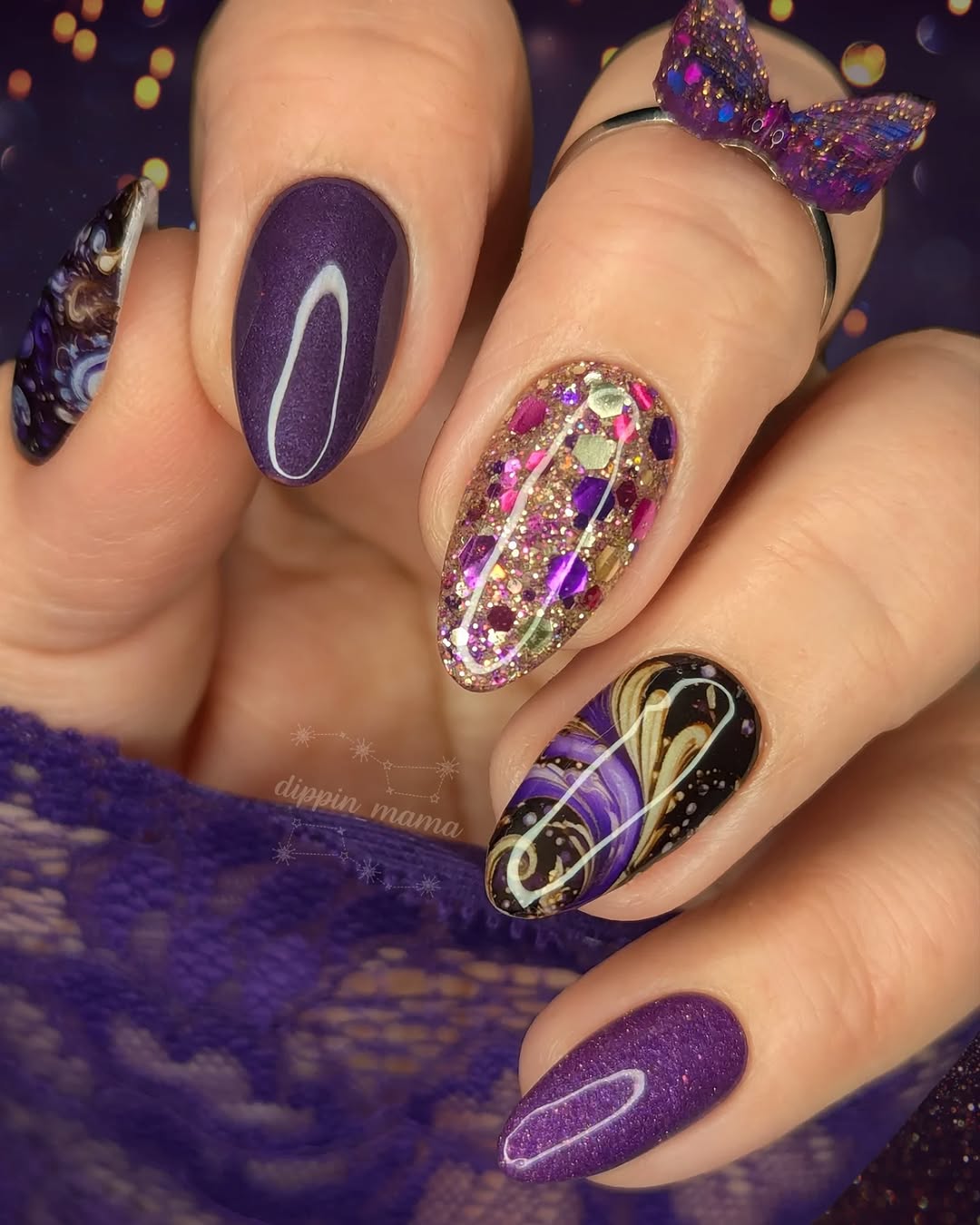 Stunning purple nails with glitter accents