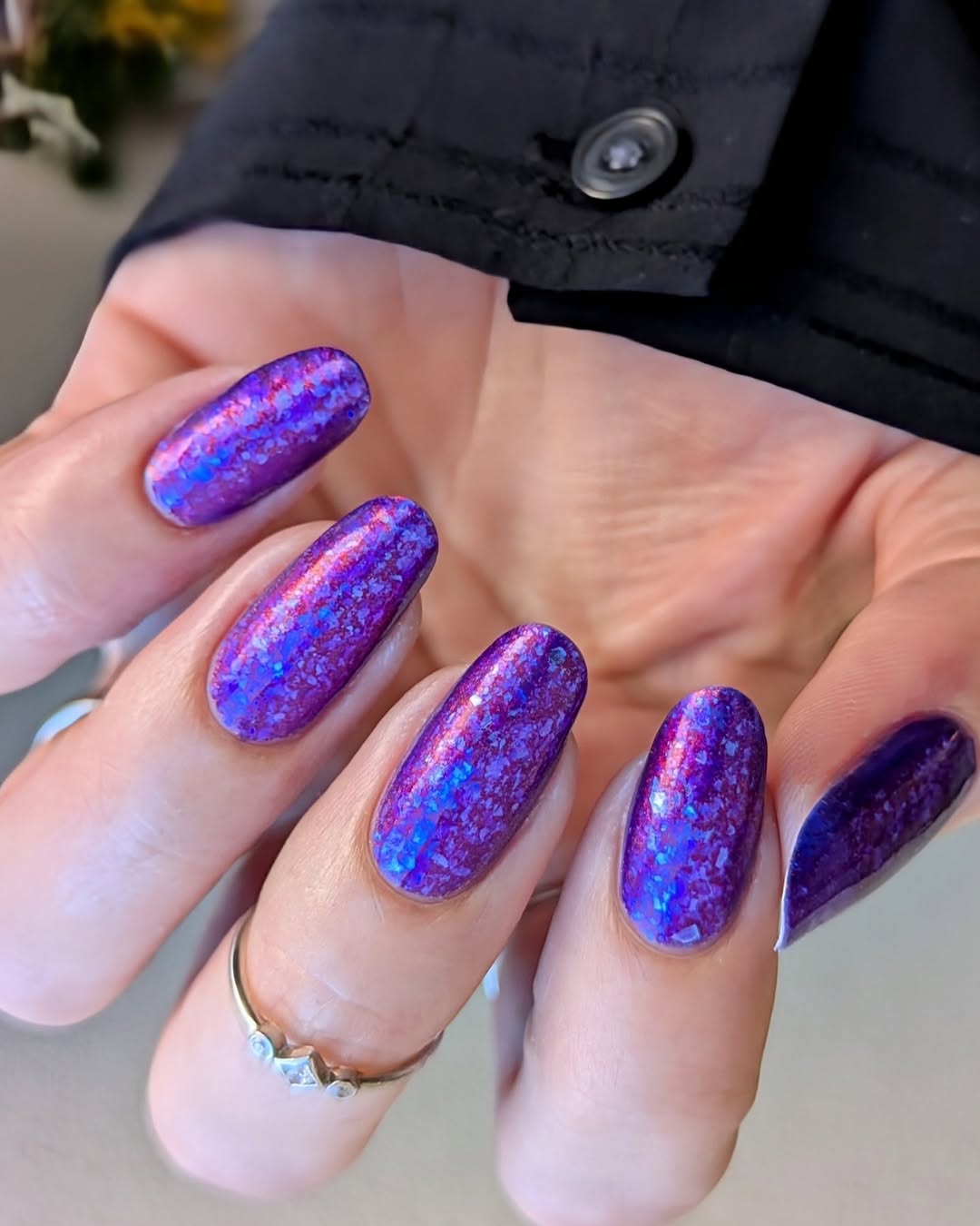 Vibrant Purple Nails with a Stunning Sparkle