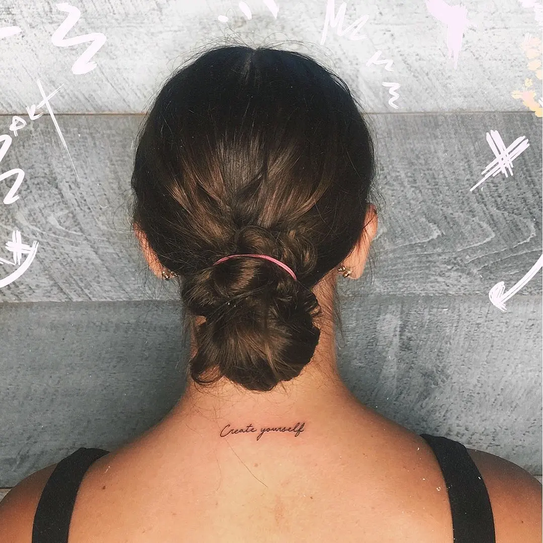 Inspirational quote tattoo on the neck