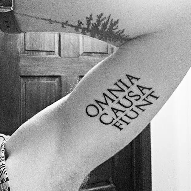 Stylish Quote Tattoo on Upper Arm
