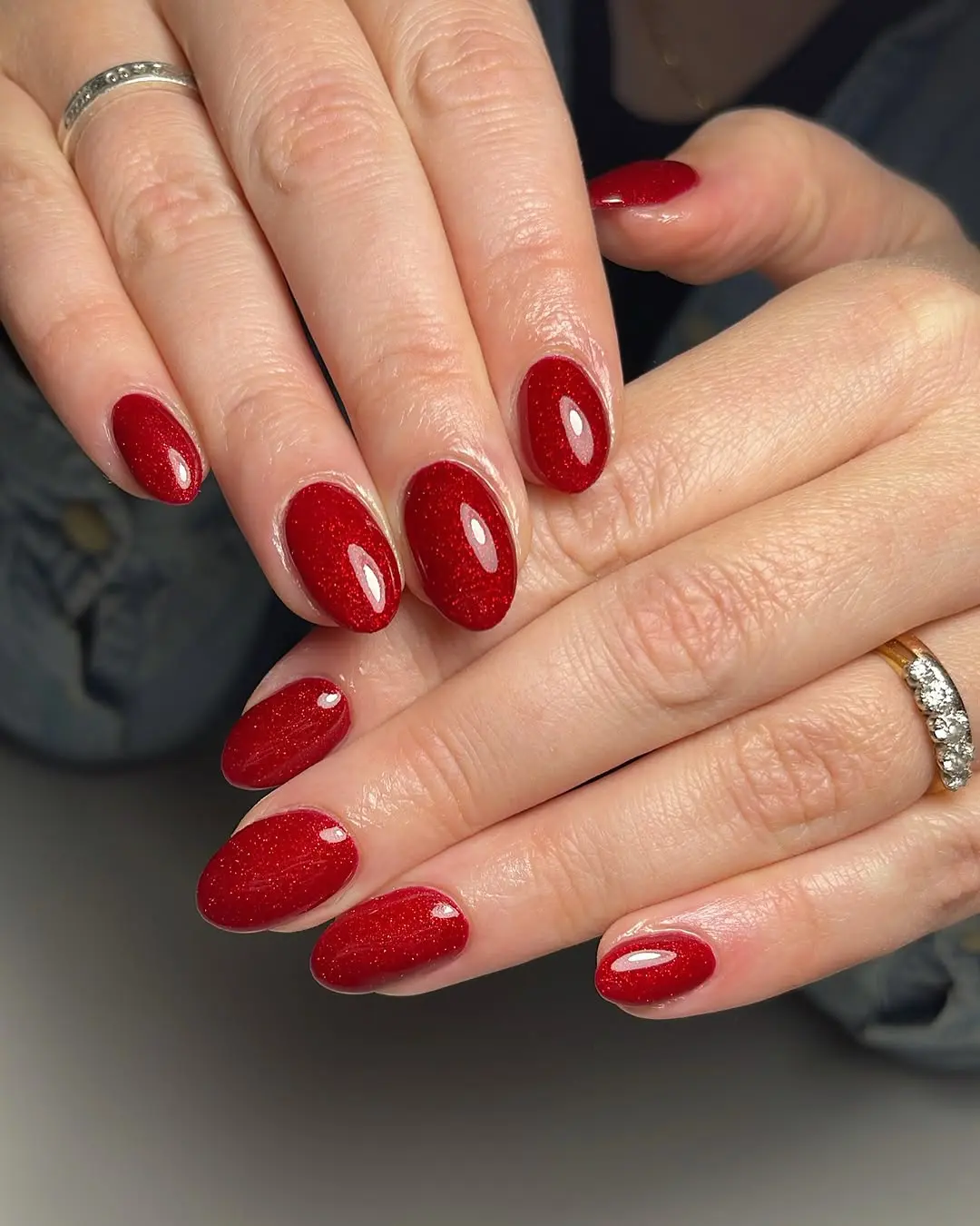 Vibrant Red Nails with Sparkling Finish