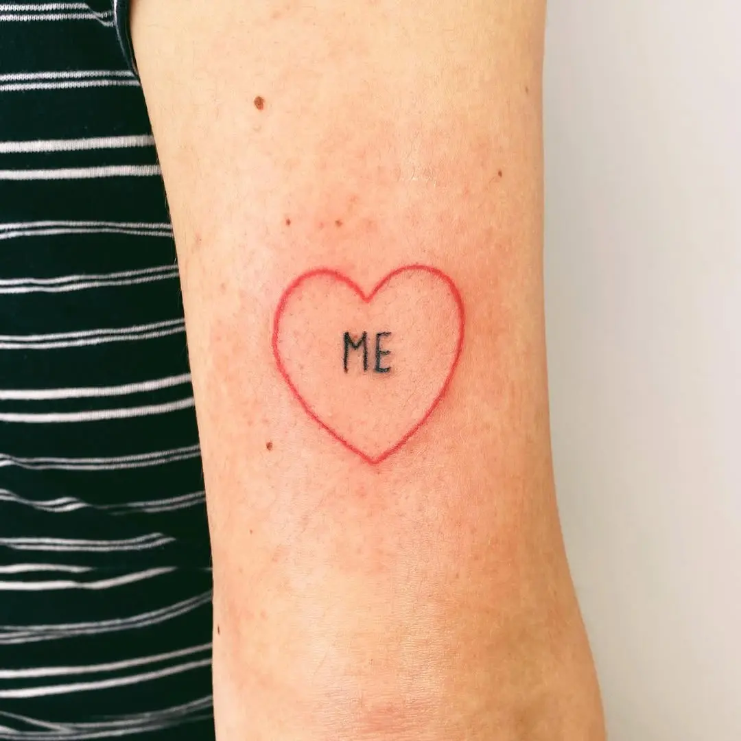Heart tattoo symbolizing self-love and identity