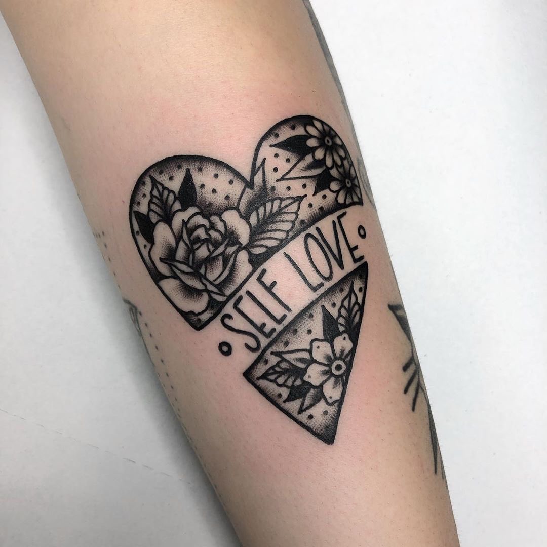 Heart tattoo embracing self-love and nature