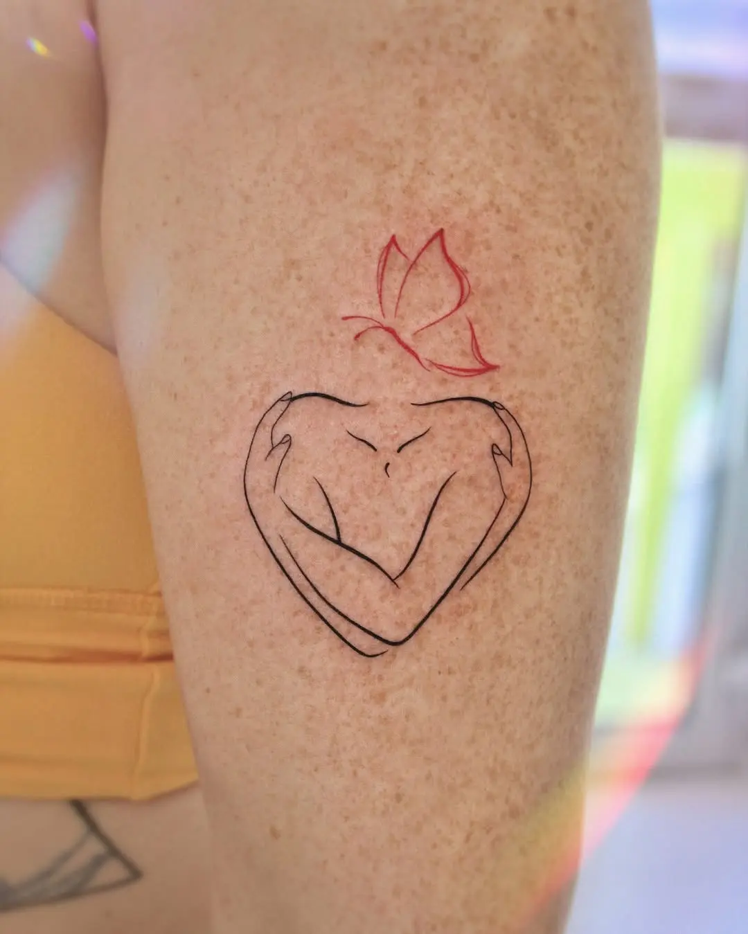 Artistic Heart Embrace with Floral Accent