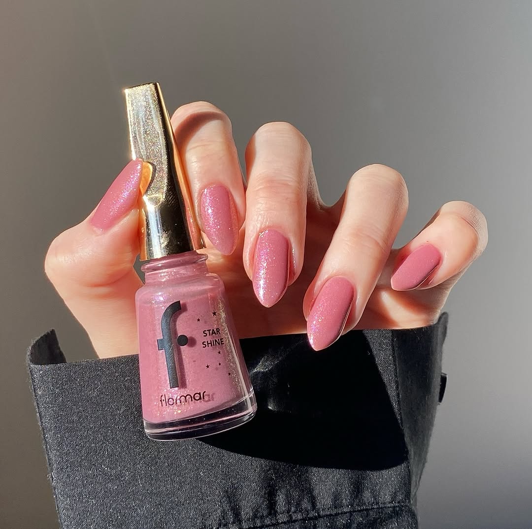Gorgeous pink nails with sparkly finish