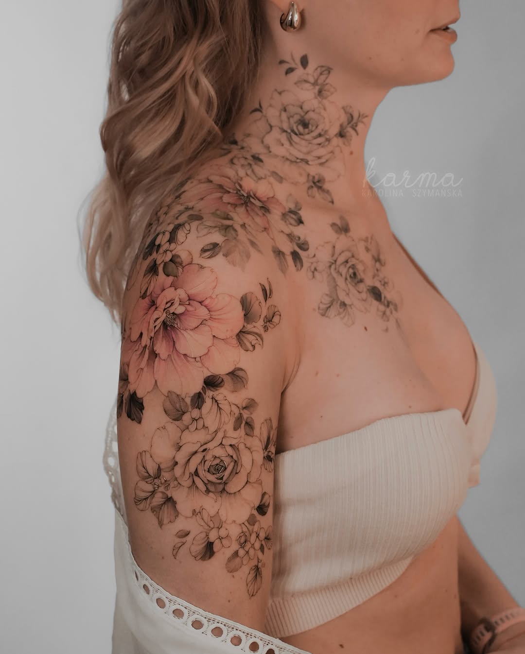 Stunning floral shoulder tattoo showcasing vibrant blooms